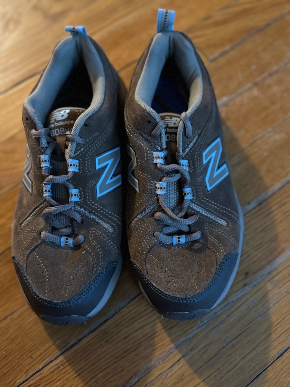 New Balance 608v4 Womenโs Brown Suede Upper with blue accents